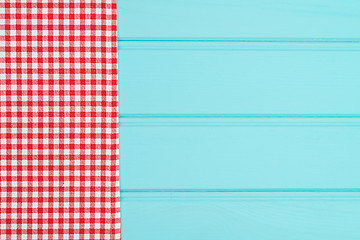 Image showing White and red towel over wooden table