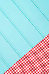 Image showing White and red towel over wooden table