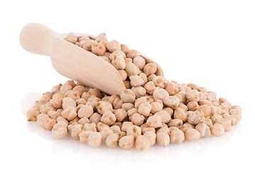 Image showing Uncooked chickpeas and wooden scoop