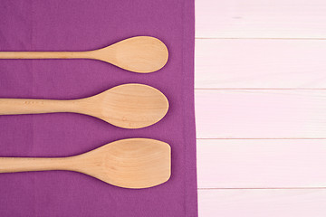 Image showing Kitchenware on purple towel