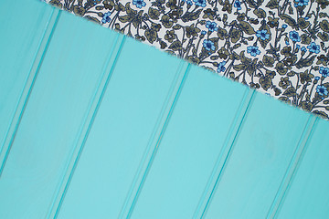 Image showing Blue and white towel over table