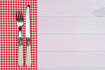 Image showing Kitchenware on red towel