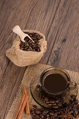 Image showing Coffee cup with burlap sack