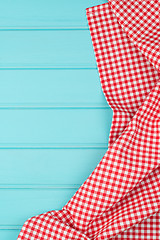 Image showing White and red towel over wooden table