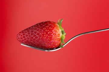 Image showing Strawberry on a fork