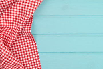 Image showing White and red towel over wooden table