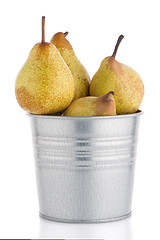 Image showing Ripe pears on metal buket