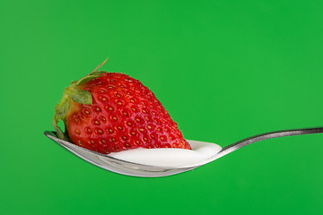 Image showing Strawberry and chocolate on a fork