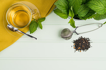 Image showing Herbal tea with melissa in a glass cup