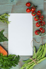 Image showing White paper and vegetables