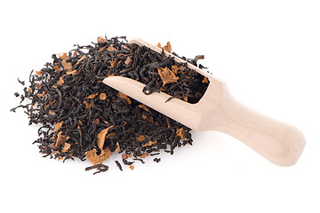 Image showing Black Dry Tea with a Wooden Spoon