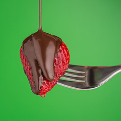 Image showing Strawberry and chocolate on a fork