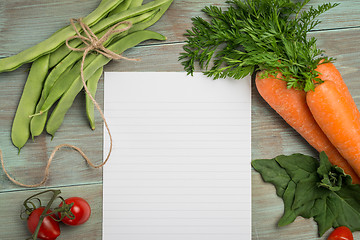 Image showing White paper and vegetables