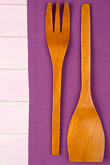 Image showing Kitchenware on purple towel