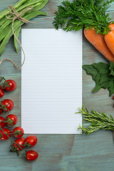 Image showing White paper and vegetables