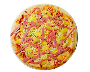 Image showing Uncooked ham and pineapple pizza


