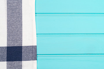 Image showing Blue and white towel over table