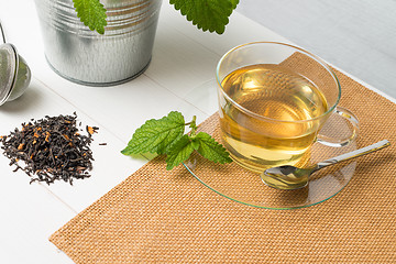 Image showing Herbal tea with melissa in a glass cup