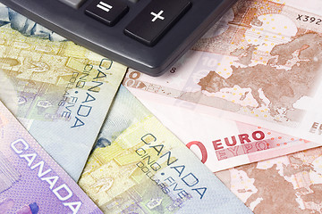 Image showing Forex - Canadian and Euro currency pair with calculator

