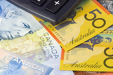 Image showing Forex - Australia and Canadian currency pair with calculator

