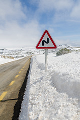 Image showing Dangerous curves sign