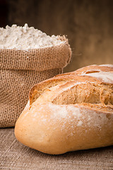 Image showing Rustic bread and flour