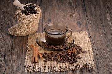 Image showing Coffee cup with burlap sack