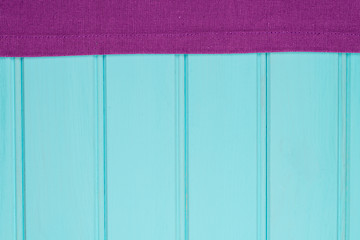 Image showing Purple towel over wooden table