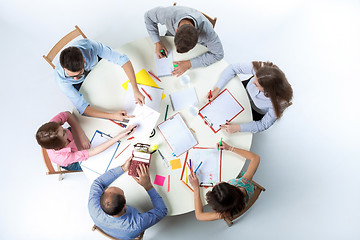 Image showing Top view of business team on workspace background 