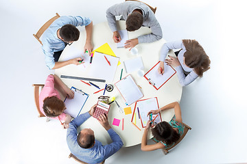 Image showing Top view of business team on workspace background 