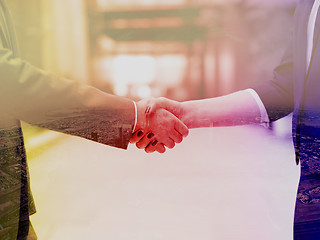 Image showing businesswoman and businessman handshake