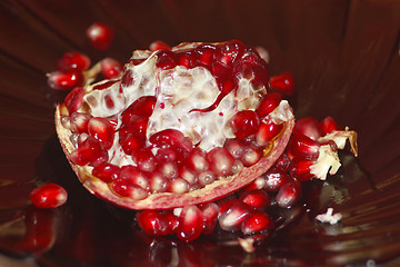 Image showing broken ripe and red pomegranate