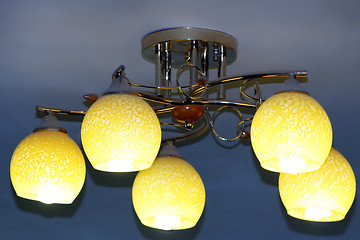 Image showing Beautiful chandelier with five plafonds