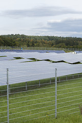 Image showing Field with blue siliciom solar cells alternative energy