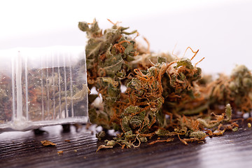 Image showing Close up Dried Marijuana Leaves on the Table