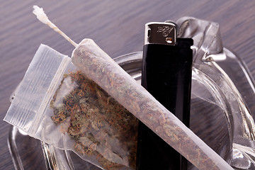 Image showing Close up of marijuana and smoking paraphernalia