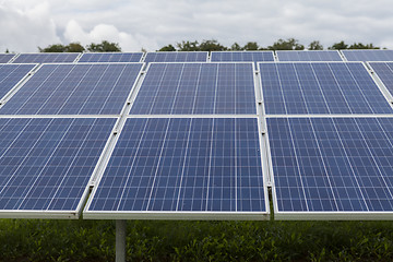 Image showing Field with blue siliciom solar cells alternative energy