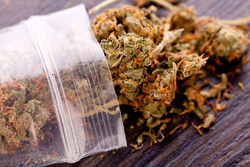 Image showing Close up Dried Marijuana Leaves on the Table