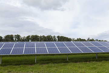 Image showing Field with blue siliciom solar cells alternative energy