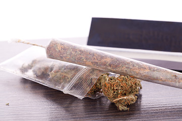 Image showing Dried Cannabis on Rolling Paper with Filter