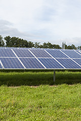 Image showing Field with blue siliciom solar cells alternative energy