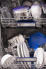 Image showing Dishwasher loades in a kitchen with clean dishes