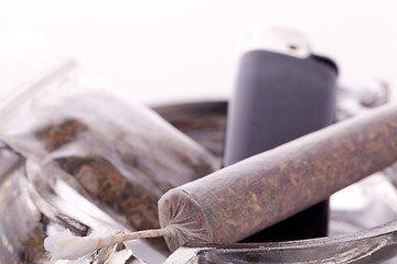 Image showing Close up of marijuana and smoking paraphernalia