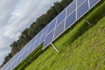 Image showing Field with blue siliciom solar cells alternative energy