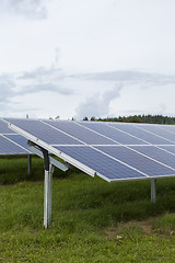 Image showing Field with blue siliciom solar cells alternative energy