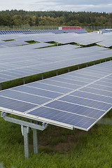 Image showing Field with blue siliciom solar cells alternative energy