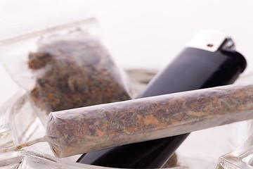 Image showing Close up of marijuana and smoking paraphernalia