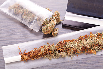 Image showing Dried Cannabis on Rolling Paper with Filter