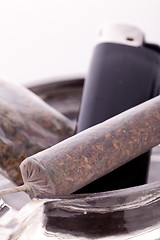 Image showing Close up of marijuana and smoking paraphernalia