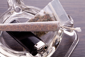 Image showing Close up of marijuana and smoking paraphernalia